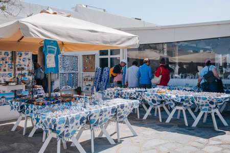 Ana Mera, Greece - September 24, 2019: Rows of stalls selling souvenirsin Ana Mera, a town on Mykonos Island famous for its monasteries.のeditorial素材