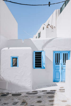 Traditional whitewashed houses with blue details in Hora (Mykonos Town), Mykonos, Greece.のeditorial素材