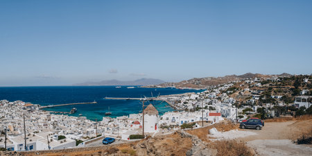 Mykonos Town, Greece - September 24, 2019: High angle panoramic view from the viewpoint of Hora...
