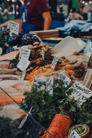 London, UK - October 17, 2021: Fresh seafood on sale at Shellseekers fishmonger stall in Borough...
