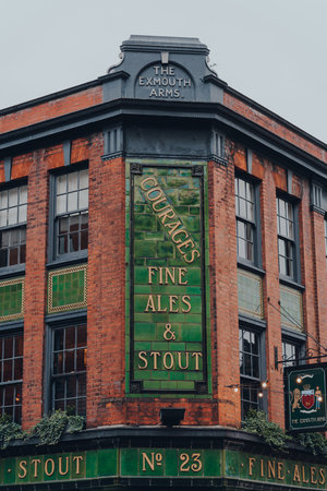 London, UK - October 23, 2021: Sign on the exterior of The Exmouth Arms pub on Exmouth Market, a semi-pedestrianised street in Clerkenwell, Islington, and a famous street market.のeditorial素材