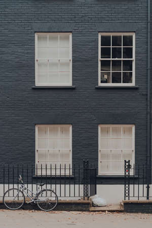 London, UK - October 23, 2021: Bike parked in front of a house on a street in Clerkenwell, London. Cycling is a popular way to get around the capital.のeditorial素材