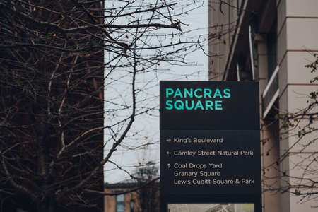 London, UK - January 01, 2022: Map and directional sign in Pancras Square, a continental-style...