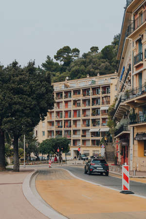 Nice, France - March 11, 2022: Car driving on The Promenade des Anglais, a 7km long promenade along the Mediterranean coast of Nice, motion blur.のeditorial素材