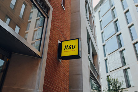 London, UK - August 26, 2022: Sign outside Itsu restaurant in Paternoster Row, City of London. Itsu is a British chain of East Asian-inspired fast food shops and restaurants, and a grocery company.のeditorial素材
