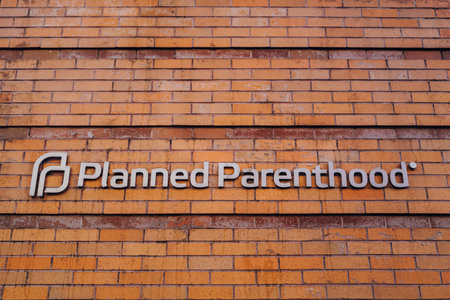 New York, USA - November 21, 2022: Name sign outside Planned Parenthood, a nonprofit organisation that provides reproductive health care in the United States and globally.のeditorial素材