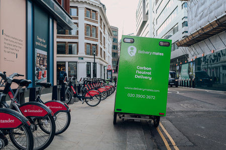 London, UK - February 02, 2023: Delivery Mates van parked on a street in the City of London. Delivery Mates is a last-mile delivery company offering sustainable carbon neutral delivery.のeditorial素材
