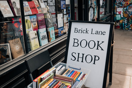 London, UK - February 09, 2023: Sign outside the Book Shop in Brick Lane, the heart of the Londons Bangladeshi-Sylheti community.のeditorial素材