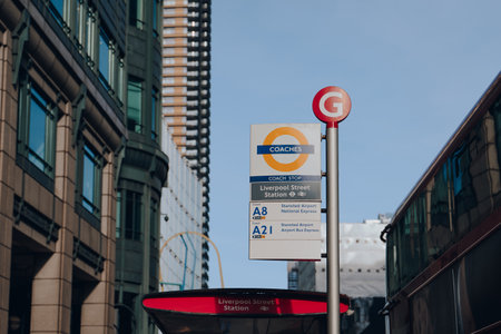 London, UK - February 09, 2023: Coach stop sign for Liverpool Street Station, selective focus. Liverpool Street is a central London railway terminus and connected London Underground station.のeditorial素材