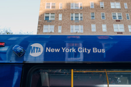 New York, USA - November 22, 2022: New York City Bus on a street in Manhattan. MTA buses cover most routes within the City of New York.のeditorial素材