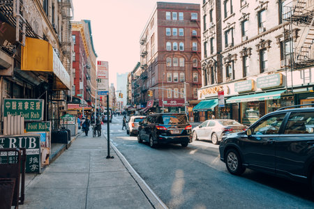 New York, USA - November 21, 2022: Cars on a street in Little Italy, a neighbourhood in Lower Manhattan in New York City, known for its large Italian population.のeditorial素材