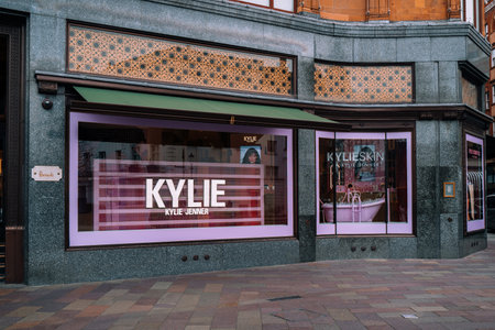 London, UK - February 21, 2023: View from the street of Kylie Cosmetics sign in the window of Harrods, a famous department store located on Brompton Road in Knightsbridge, London.のeditorial素材