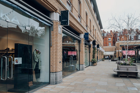 London, UK - February 21, 2023: Row of shops in Sloane Square, an upscale area of London famous for...