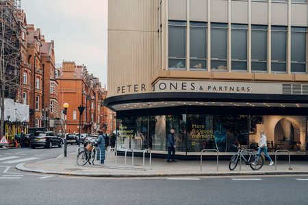 London, UK - February 21, 2023: Facade of Peter Jones department store in Sloane Square, an upscale area of London famous for shopping, culture and dining.のeditorial素材