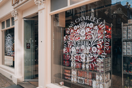 London, UK - April 13, 2023: Sign celebrating coronation of King Charles III in the window of Liberty, a department store in Oxford Circus famous for luxury goods and classic Liberty designs.のeditorial素材