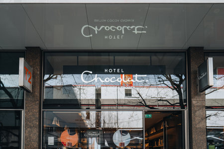 London, UK - April 13, 2023: Exterior of Hotel Chocolat store in Tottenham Court Road. Hotel Chocolat is British chocolate manufacturer and the only company in the UK to grow cocoa on its own farm.のeditorial素材