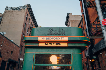 November 23, 2022 - New York, USA: View of Bandits, a diner serving burgers and bar snacks in a retro setting on Bedford Street in West Village, Manhattan.のeditorial素材