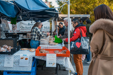 November 23, 2022 - New York, USA: Breezy Hill Orchard stall at the Grow NYC Union Square Greenmarket, a year-round farmers market with various farm and small batch food producers.のeditorial素材