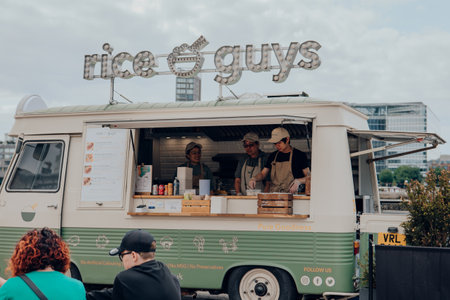 London, UK - July 06, 2023: Rice guys food truck on Thames riverside by Tower of London, one of London's top tourist attractions.のeditorial素材
