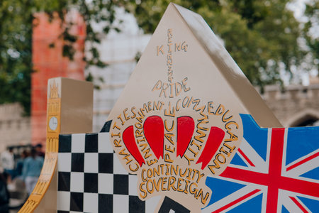 London, UK - July 06, 2023: Close up of the crown on one of the winning benches the Tower of London schools coronation competition. Fifteen winners were selected from more than 1,500 entries.のeditorial素材