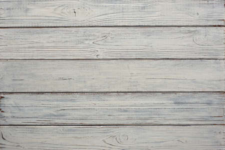 Dark brown brushed burnt wooden planks backgroundの写真素材