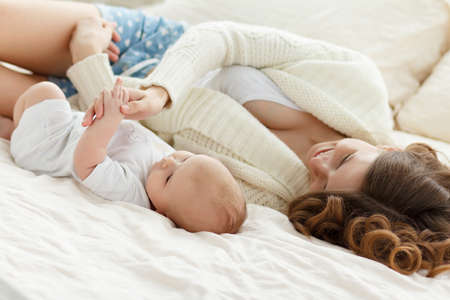 Mom and her newborn baby. Mother's dayの写真素材