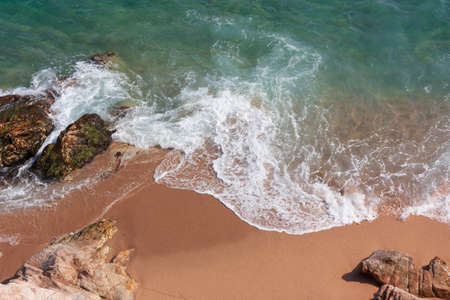 Waves on the sandy beach