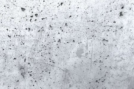 Texture of light gray concrete wall with cracksの写真素材