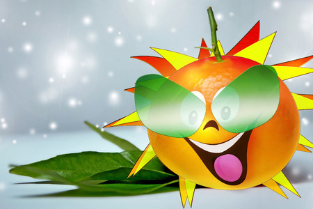 Holiday card with a happy orangeの写真素材