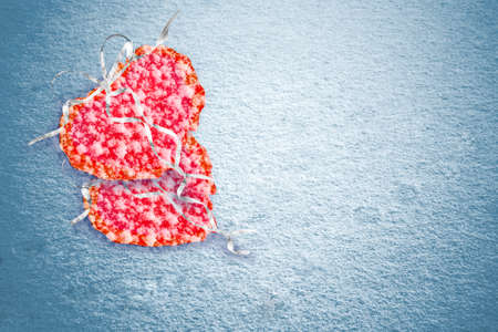 Heart on snowy background. Holiday cardの写真素材
