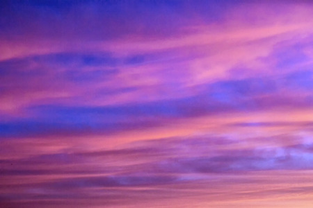 Blurred background. Bright sky with fluffy clouds.の写真素材