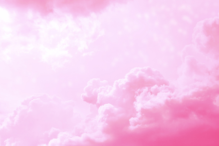 Blurred background. Blue sky and white fluffy clouds.の写真素材