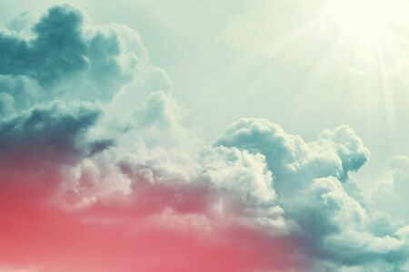 Blurred background. Blue sky and white fluffy clouds.
