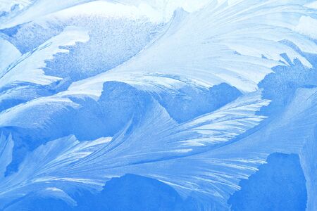 Snowflake. Abstract winter background. frosty patterns on the window