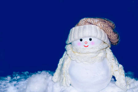 Funny happy snowman. Winter landscape. Merry christmas and happy new year greeting cardの写真素材
