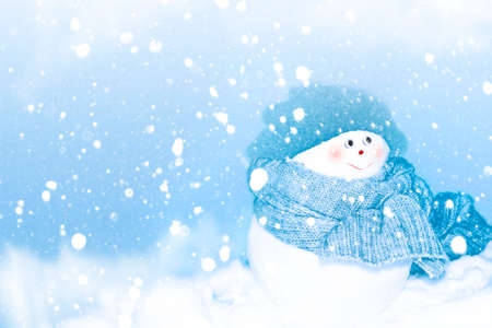 Funny happy snowman. Winter landscape. Merry christmas and happy new year greeting cardの写真素材