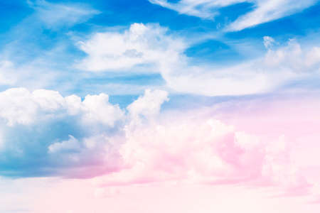 Blurred background. Blue sky and white fluffy clouds.