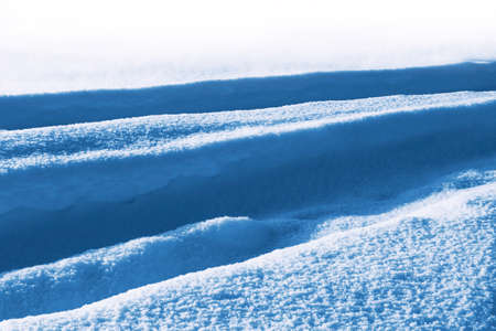 Snowy background from a winter road. Winter landscape. Nature.