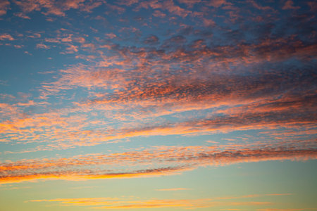 Blurred background. Blue sky and white fluffy clouds.の写真素材