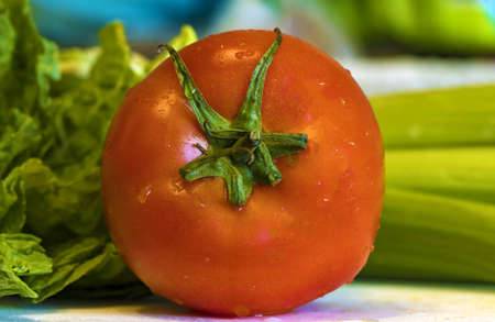 Appetizing tomatoes in the kitchen. Tasty and healthy food