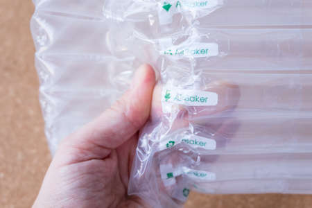 translucent air packaging hands hold, protection of goods, plastic packaging