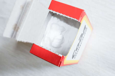 Baking soda in a paper box. Packaging of soda in the kitchenのeditorial素材