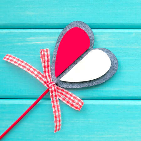 Decorative heart for Valentines Day. Turquoise background.の写真素材