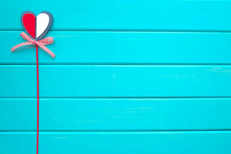 Heart on a turquoise background. Valentines Day.の写真素材