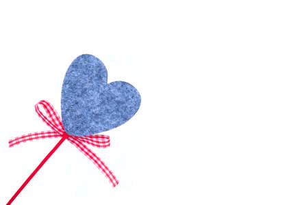 Felting heart. For the holiday of all lovers. Background with a gray heart on the leftの写真素材