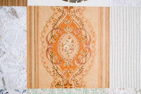 Part of the old wallpaper. Square wallpaper on the wall. Backgroundの写真素材