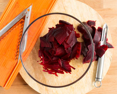 Boiled beets grated in strips in a bowlの写真素材