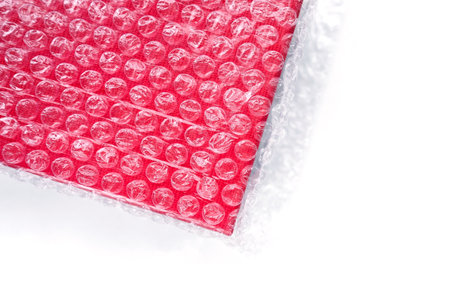 The red box is wrapped in a transparent bag with vacuum bubblesの写真素材