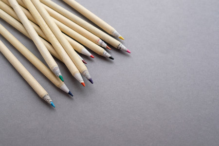 Pencils made of eco-friendly materials lie on a gray background. There is a place for text.の写真素材