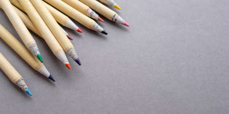 Gray background with eco pencils. Colored stationeryの写真素材